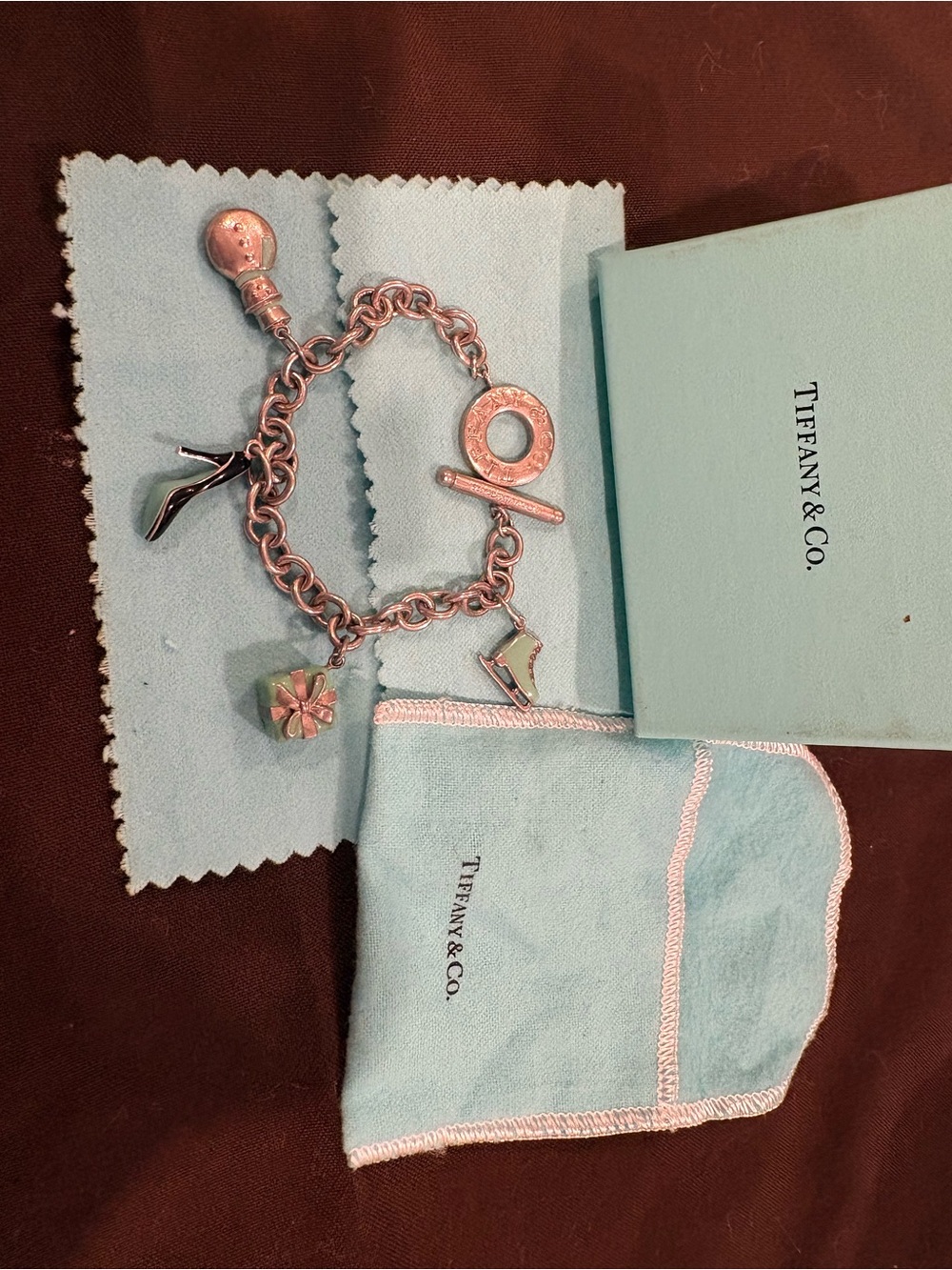Tiffany & Co. Silver Charm Bracelet with Gift & Shoe Charms